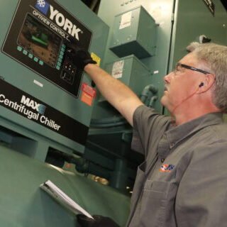 hays employee inspecting hardware